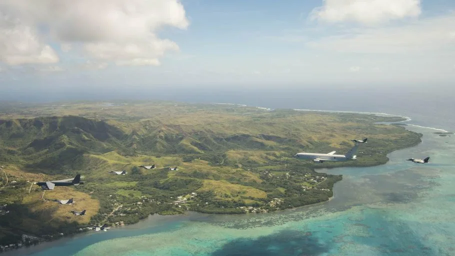 Aircraft flying over Guam photo