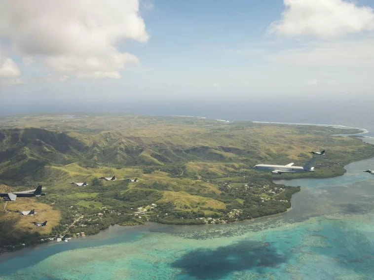 Aircraft flying over Guam photo