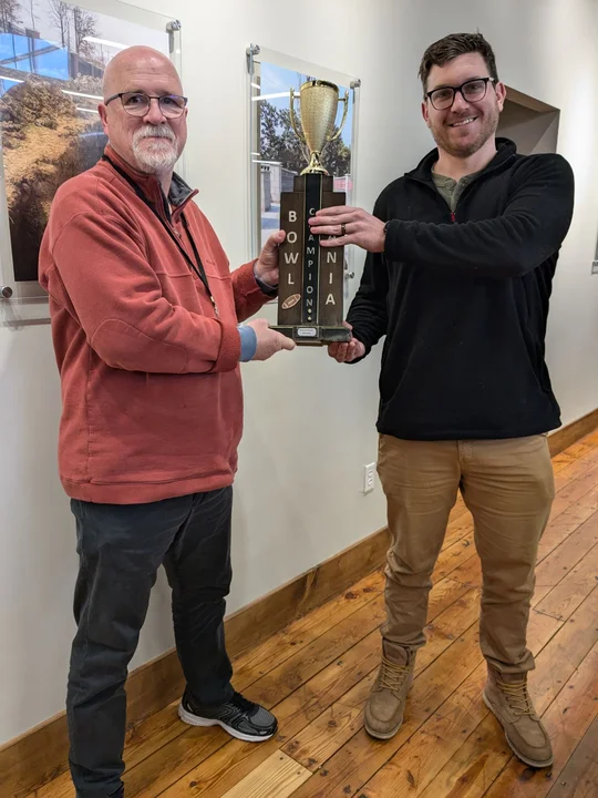 Bowlmania 2024 trophy hand-off_resized
