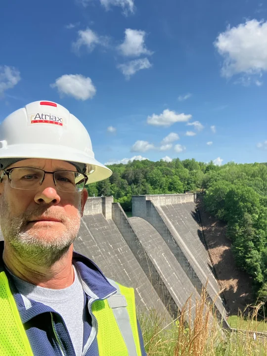 Steve with dam in background